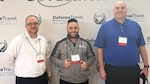 Trevor Draut, Giovanni Morales and Justin Riker of DLA Troop Support Defense Support Travel team in Alexandria, Virginia for the 2024 GovTravels Symposium.