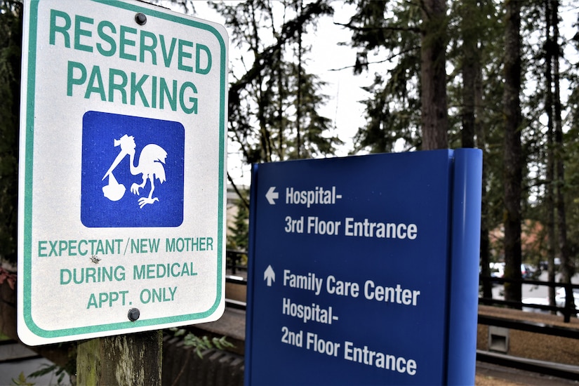 A reserved parking sign for expectant mothers is photographed.