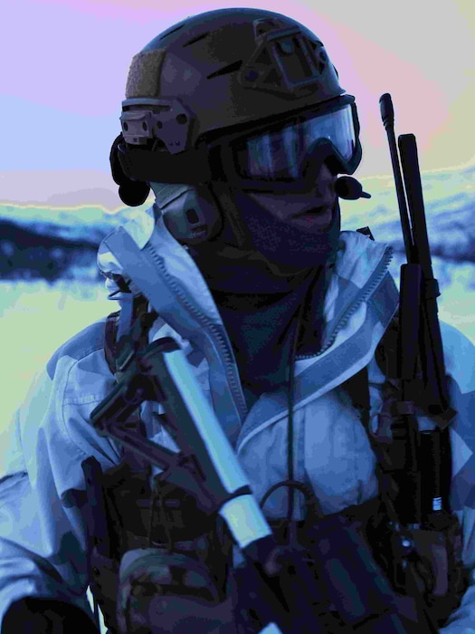 An Airman scans the horizon.