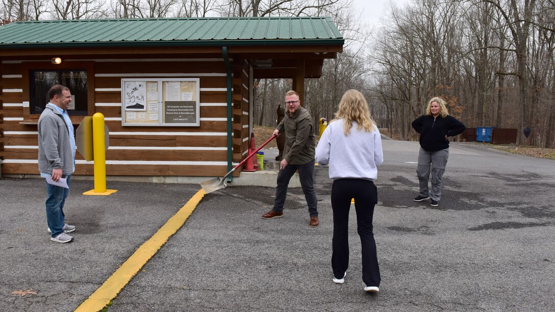 Dale Hollow Lake Resource Manager Crystal Tingle (Right) and Park Ranger Desmaray Brown (Second from Right) interact with actors during a visitor assistance training scenario March 6, 2024, at Canal Campground in Grand Rivers, Kentucky. (USACE Photo by Lee Roberts)