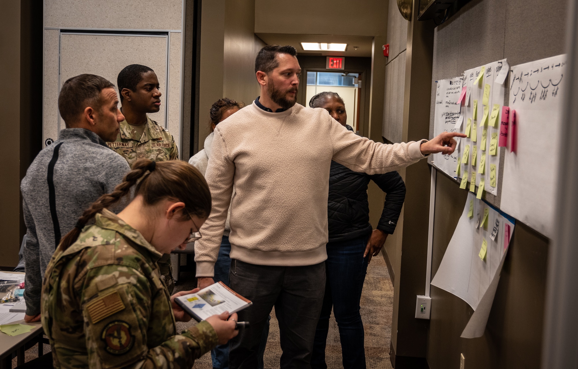 Ken Harris, 932nd AW Program Manager for Process Improvement and Innovation (CI²), discusses a group’s analysis of the reasons for continued failures in their assembly lines and ways to improve the process, Jan. 25, 2024, Scott Air Force Base, Illinois.  (U.S. Air Force photo by Christopher Parr)