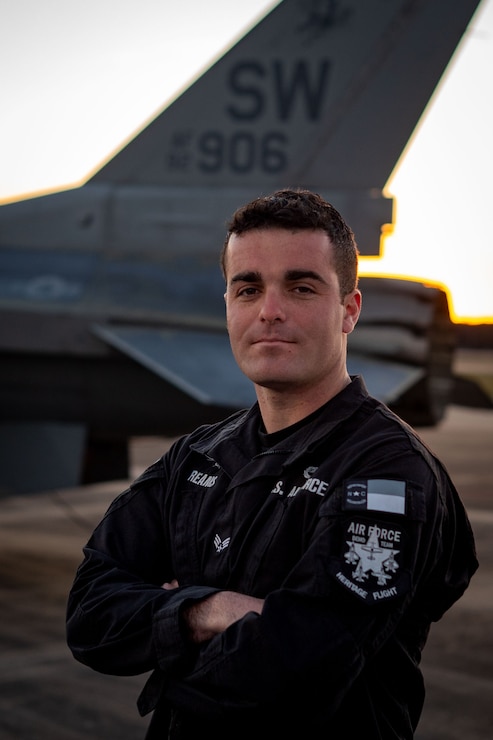 Airman poses for photo