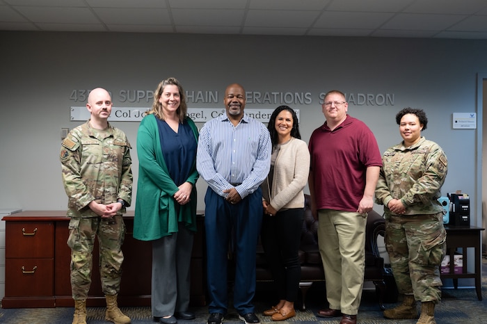 Members of the Internal Controls Flight line up in the 435th SCOS office