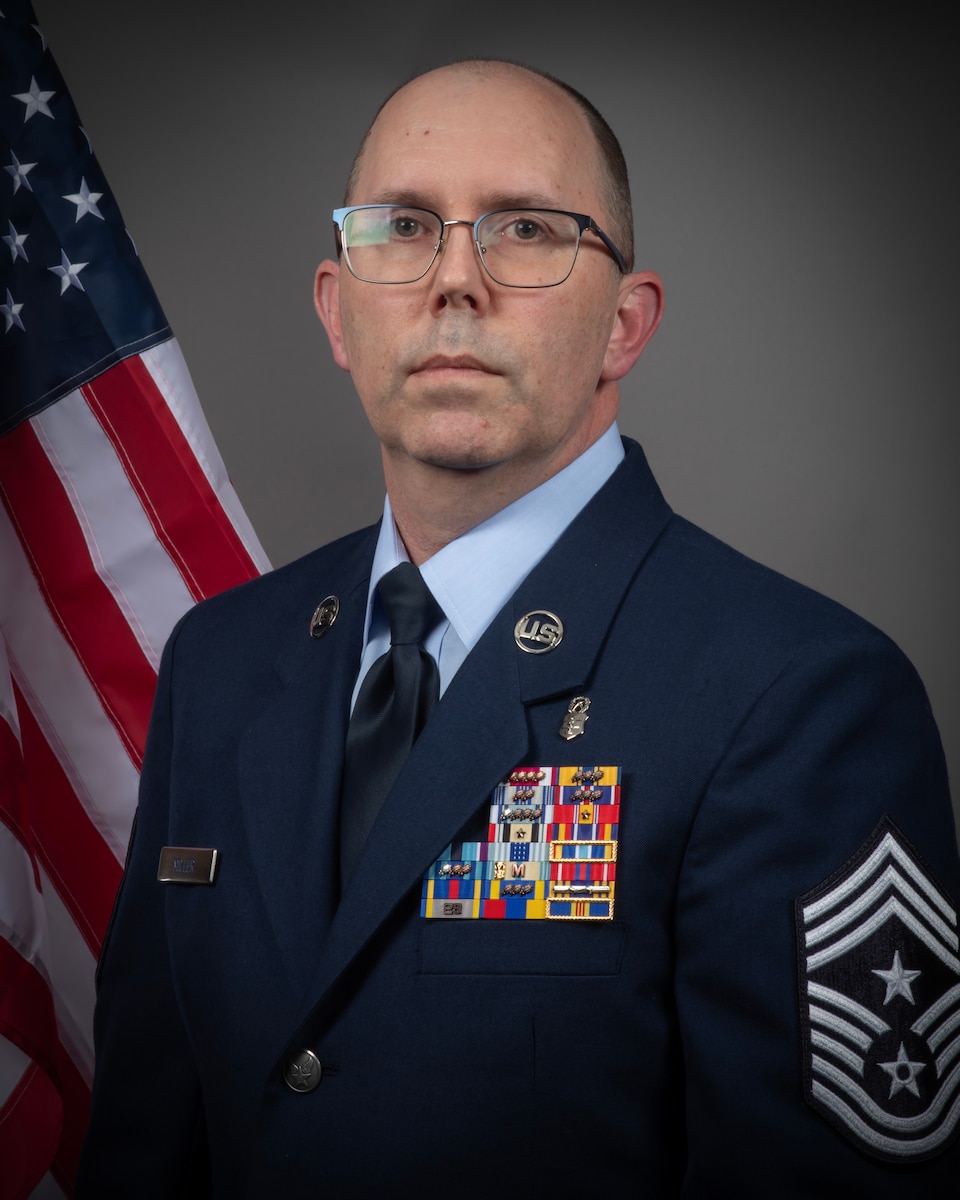 U.S. Air Force Command Chief Master Sgt. Wayne Miller, New Jersey State Command Chief, stands for an official portrait on Joint Base McGuire-Dix-Lakehurst, New Jersey, March 11, 2024.