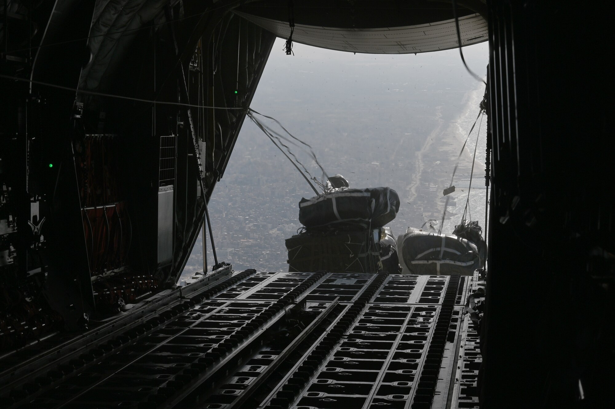 An HC-130J Combat King II conducts an airdrop of humanitarian assistance over Gaza, Mar. 11, 2024.