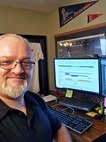 Jason Buchanan at his desk, where he serves the Walla Walla District remotely from Missouri.