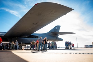 Retired U.S. Air Force maintainers and their families tour a B-1B Lancer during a maintainer reunion at Dyess Air Force Base, Texas, Feb. 24, 2024. The maintenance reunion is an event intended to reunite all current and past maintenance personnel and to honor fallen members. (U.S. Air Force photo by Senior Airman Leon Redfern)