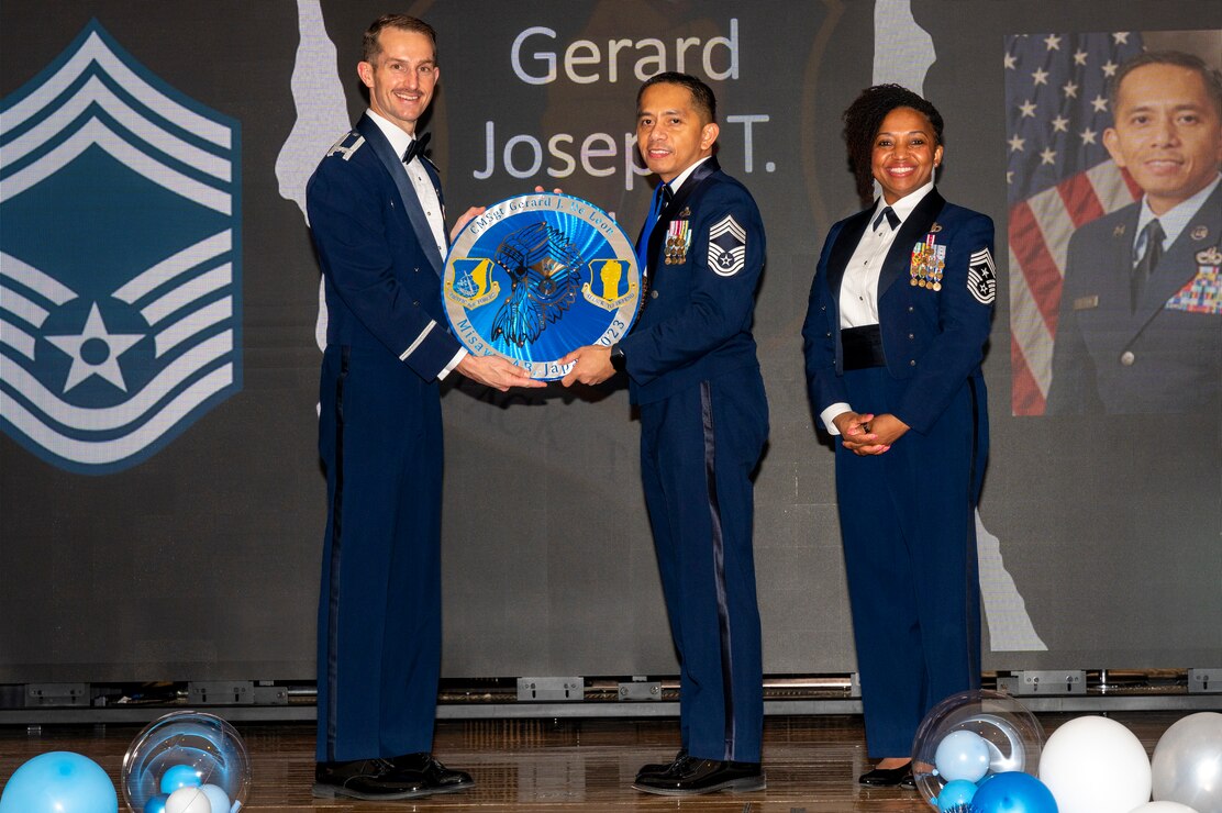 U.S. Air Force Chief Master Sgt. Gerard Joseph De Leon, 35th Maintenance Group Staff senior enlisted leader, is given a recognition plaque during a Chief Master Sergeant Recognition Ceremony at Misawa Air Base, Japan, March 9, 2024.