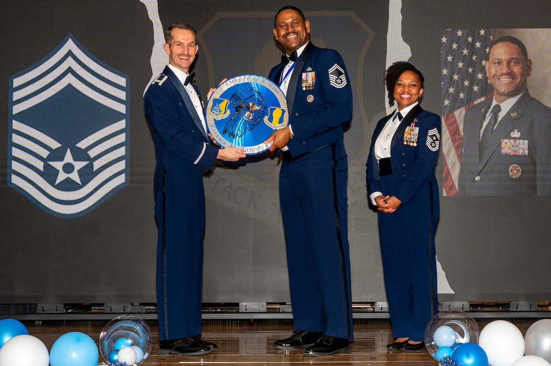 U.S. Air Force Senior Master Sgt. Troy Grant, 35th Communication Squadron Cyber Space Operations superintendent, is given a recognition plaque during a Chief Master Sergeant Recognition Ceremony at Misawa Air Base, Japan, March 9, 2024.