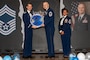 U.S. Air Force Chief Master Sgt. Joshua Hawkins, 35th Maintenance Group ammo production section chief, is given a recognition plaque during a Chief Master Sergeant Recognition Ceremony at Misawa Air Base, Japan, March 9, 2024.