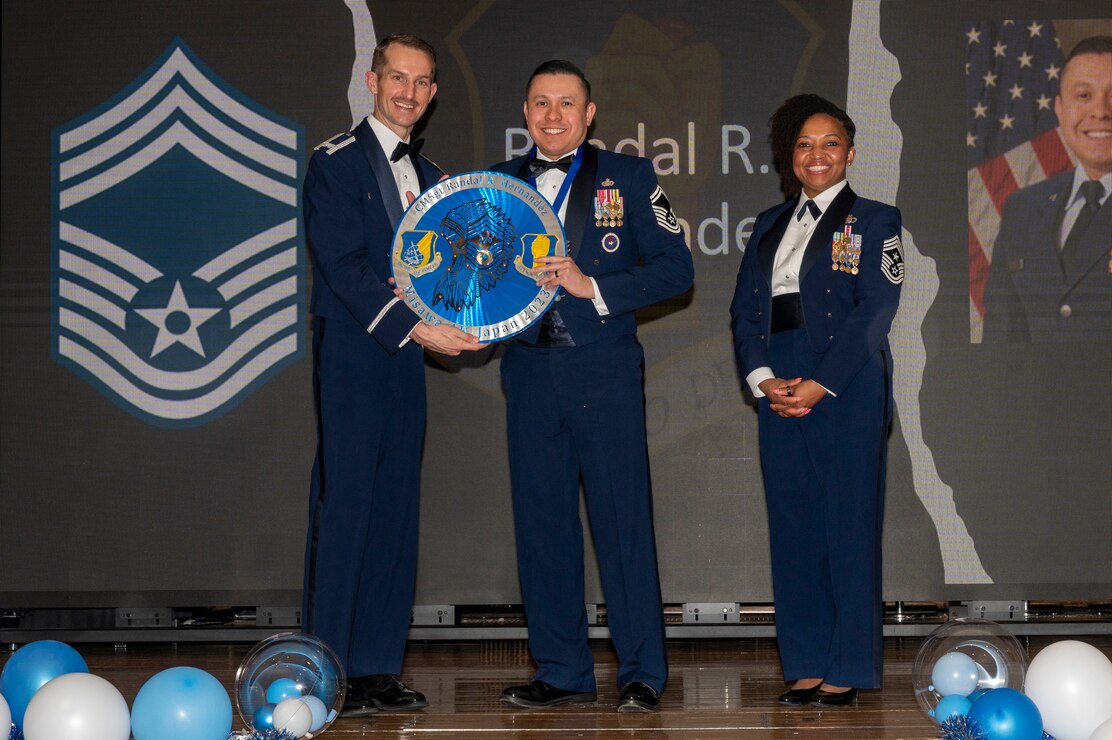 U.S. Air Force Chief Master Sgt. Randal Hernandez, 35th Logistic Readiness Squadron superintendent, is given a recognition plaque during a Chief Master Sergeant Recognition Ceremony at Misawa Air Base, Japan, March 9, 2024.