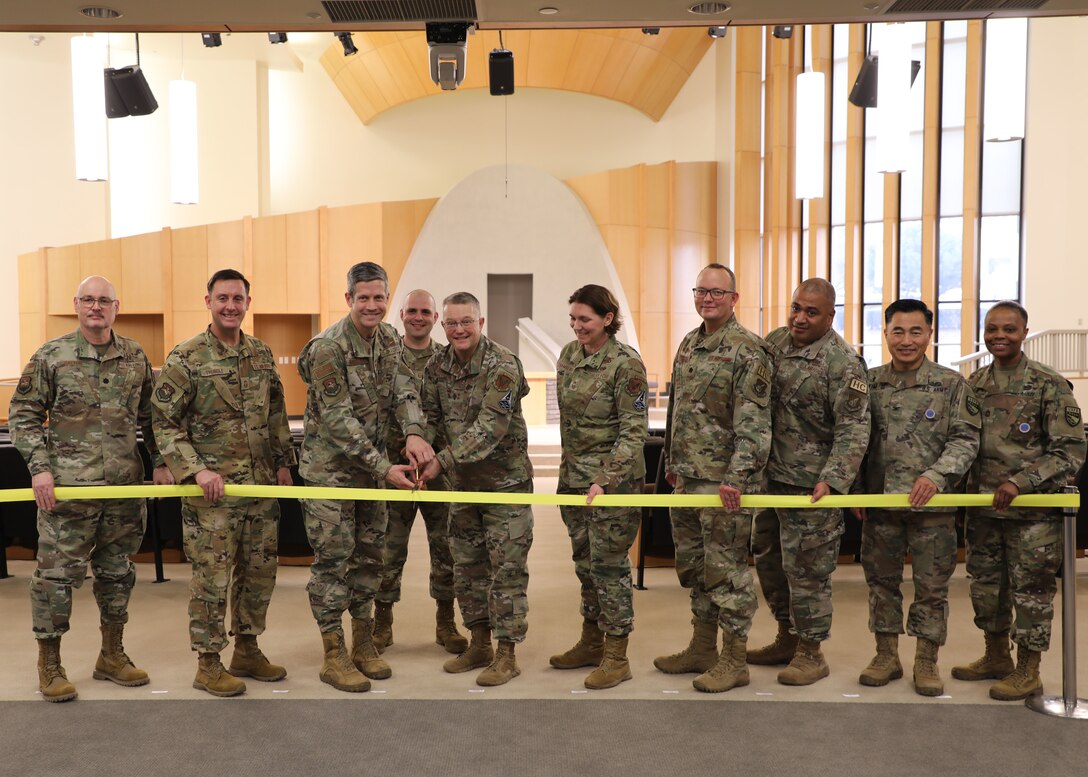 Maj. Gen. Randall Kitchens, U.S. Air Force Chief of Chaplains, and Col. William McKibban, 51st Fighter Wing commander, cut the ribbon on Feb. 29, 2024, inaugurating the Osan Air Base Chapel. This event marks the opening of the new facility constructed by the U.S. Army Corps of Engineers – Far East District and Republic of Korea Ministry of National Defense – Defense Installation Agency under the Yongsan Relocation Program. (U.S. Army photo by Yohan An)
