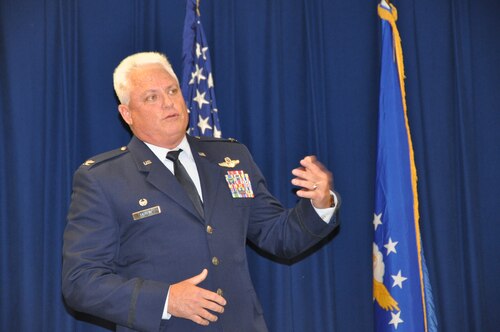 a man speaks to an audience