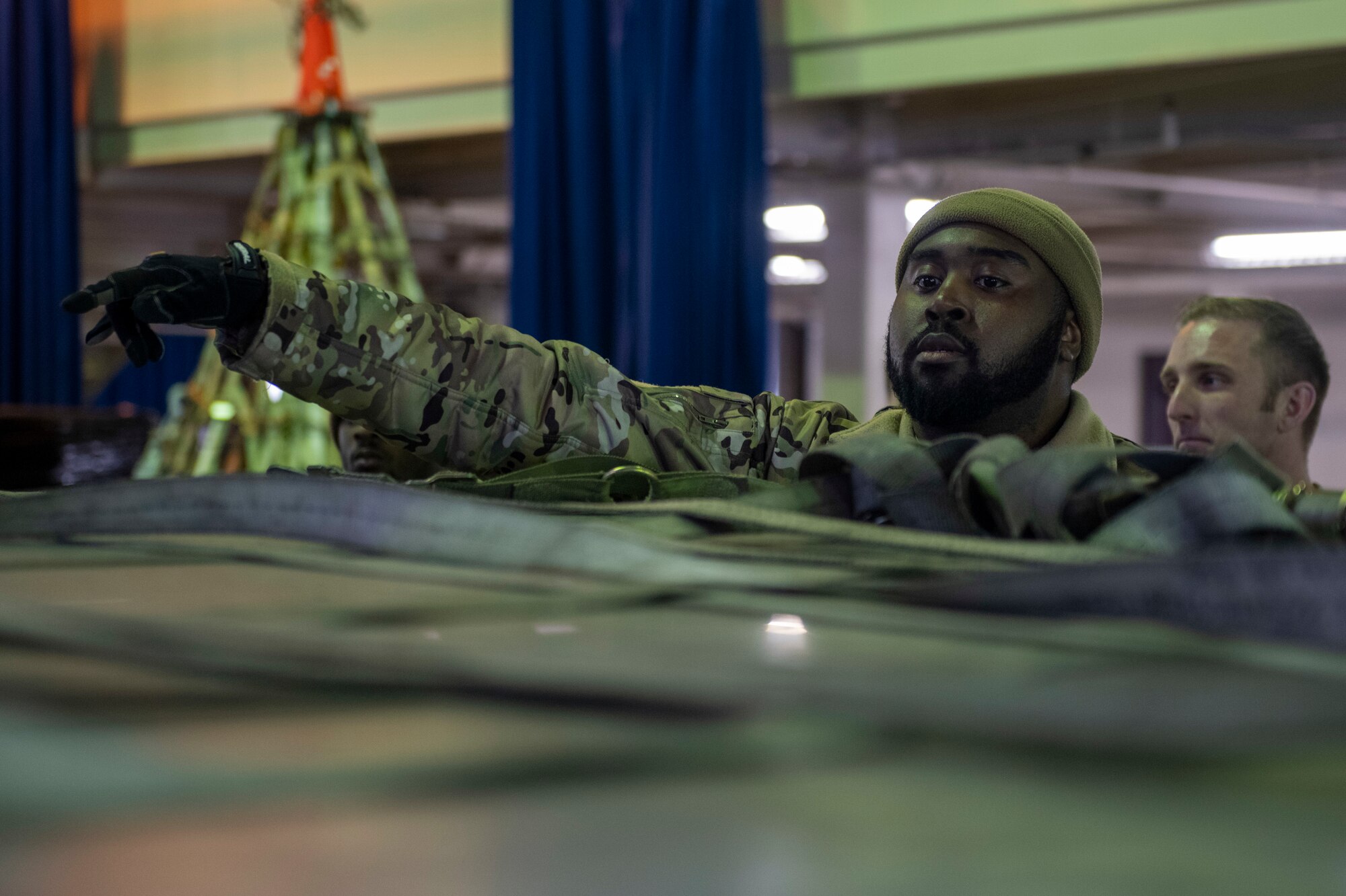 A U.S. Air Force Airman instructs cargo preparation and movement training during a Multi-Capable Airman (MCA) course at Misawa Air Base, Japan, March 5, 2024.