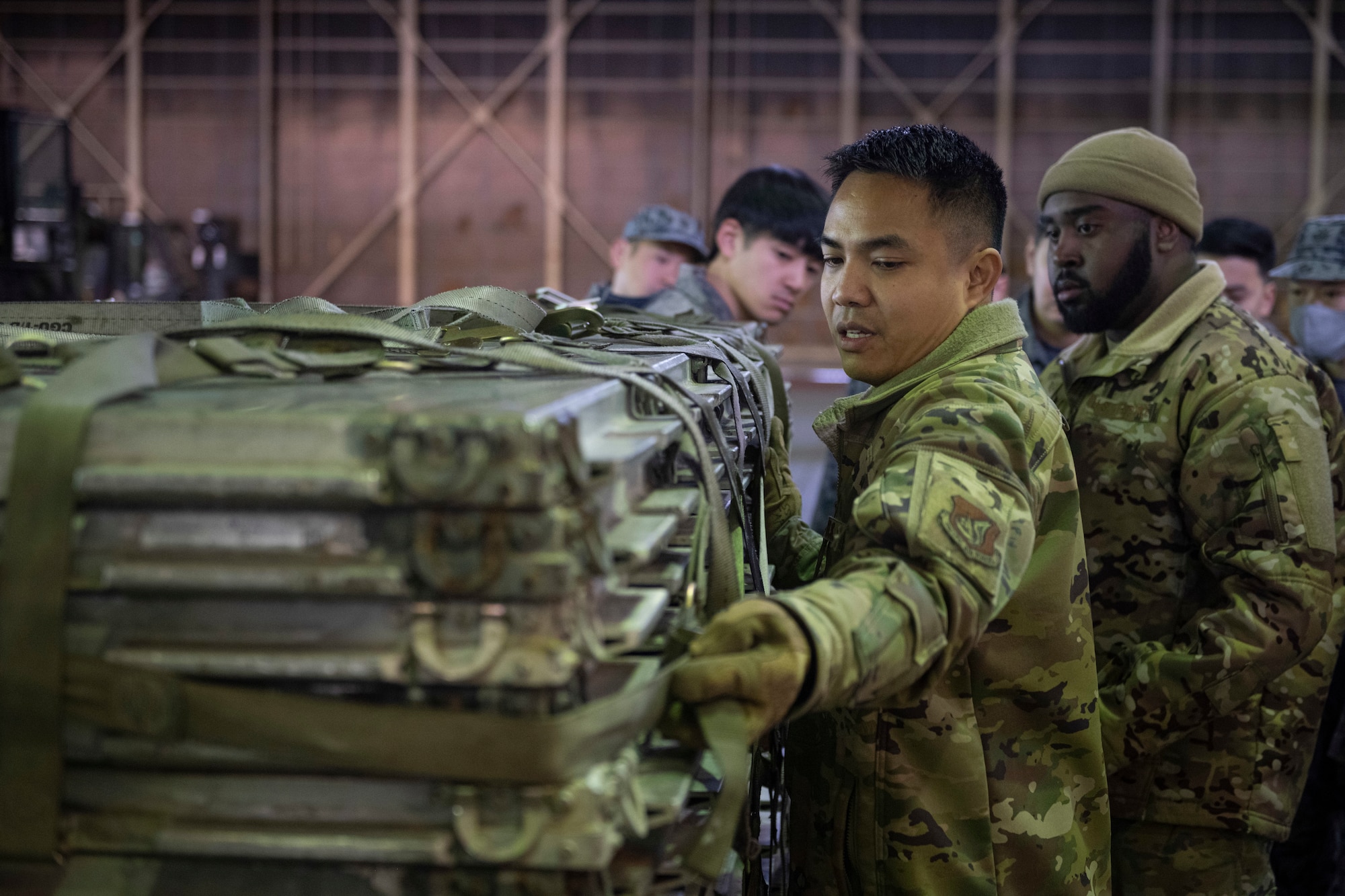 A U.S. Air Force Airman instructs cargo preparation and movement training during a Multi-Capable Airman course at Misawa Air Base, Japan, March 5, 2024.