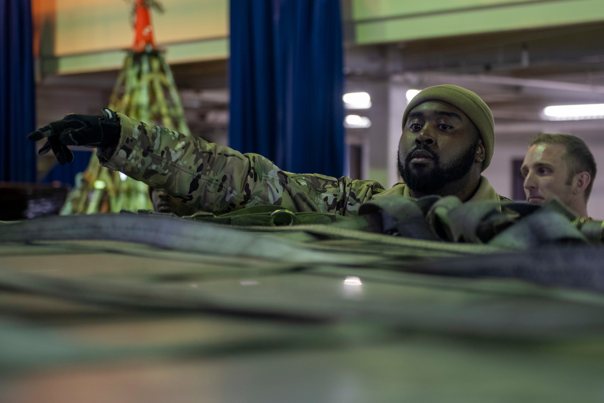 A U.S. Air Force Airman instructs cargo preparation and movement training during a Multi-Capable Airman (MCA) course at Misawa Air Base, Japan, March 5, 2024.