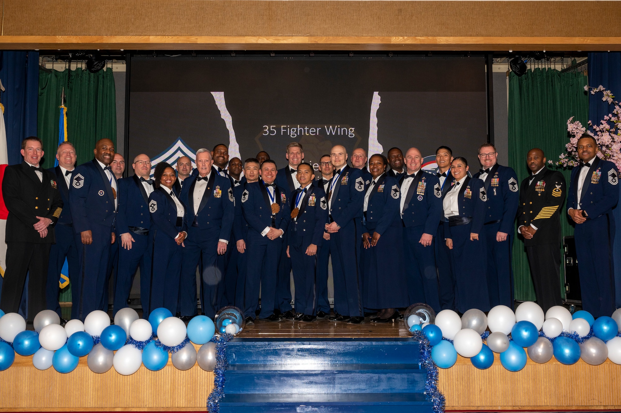 Chief Master Sergeants of Misawa Air Base pose for a group photo during the Chief Master Sergeant Recognition Ceremony at Misawa Air Base, Japan, March 9, 2024.