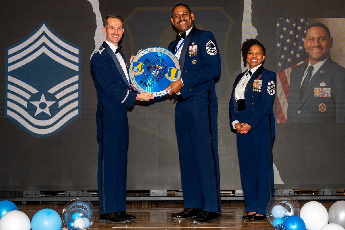 U.S. Air Force Senior Master Sgt. Troy Grant, 35th Communication Squadron Cyber Space Operations superintendent, is given a recognition plaque during a Chief Master Sergeant Recognition Ceremony at Misawa Air Base, Japan, March 9, 2024.