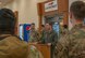 U.S. Air Force Col. Daniel Hoadley, 5th Bomb Wing commander, gives remarks at the kickoff event for the 2024 Air Force Assistance Fund campaign at Minot Air Force Base, North Dakota, March 11, 2024. The Air Force Assistance Fund provides aid to Airmen through its four charities: Air Force Aid Society, Air Force Enlisted Village, Air Force Villages Charitable Foundation and the General and Mrs. Curtis E. Lemay Foundation. (U.S. Air Force photo by Airman 1st Class Kyle Wilson)