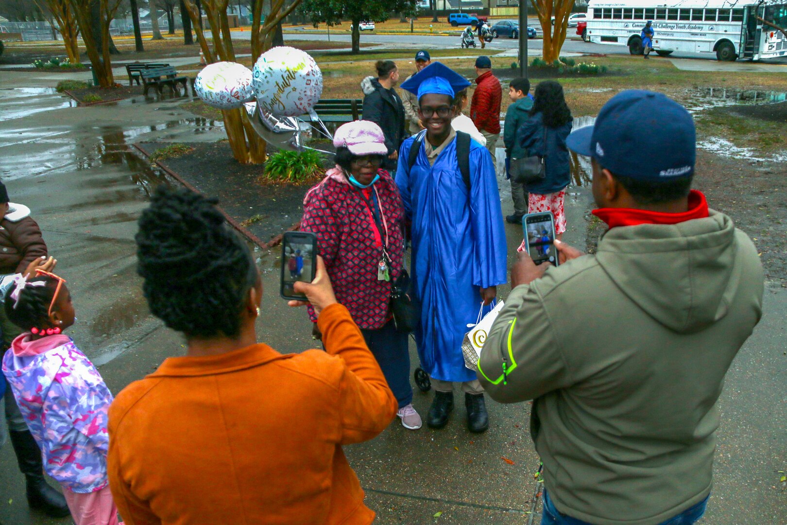 Families taking photos outside