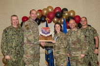 Joint Base Charleston personnel pose for a photo.