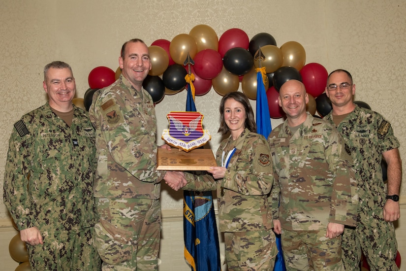 Joint Base Charleston personnel pose for a photo.