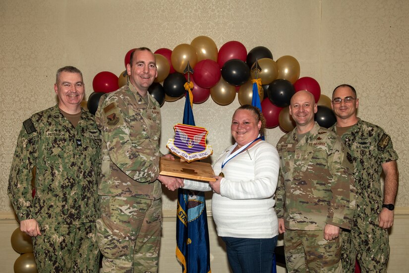 Joint Base Charleston personnel pose for a photo.