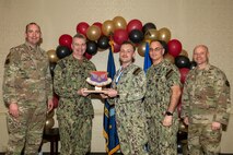 Joint Base Charleston personnel pose for a photo.