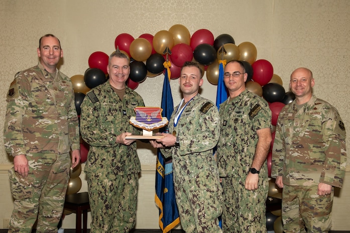 Joint Base Charleston personnel pose for a photo.