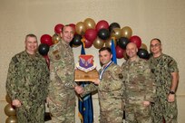 Joint Base Charleston personnel pose for a photo.