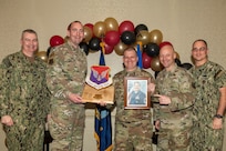 Joint Base Charleston personnel pose for a photo.