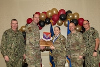 Joint Base Charleston personnel pose for a photo.
