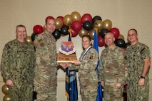 Joint Base Charleston personnel pose for a photo.