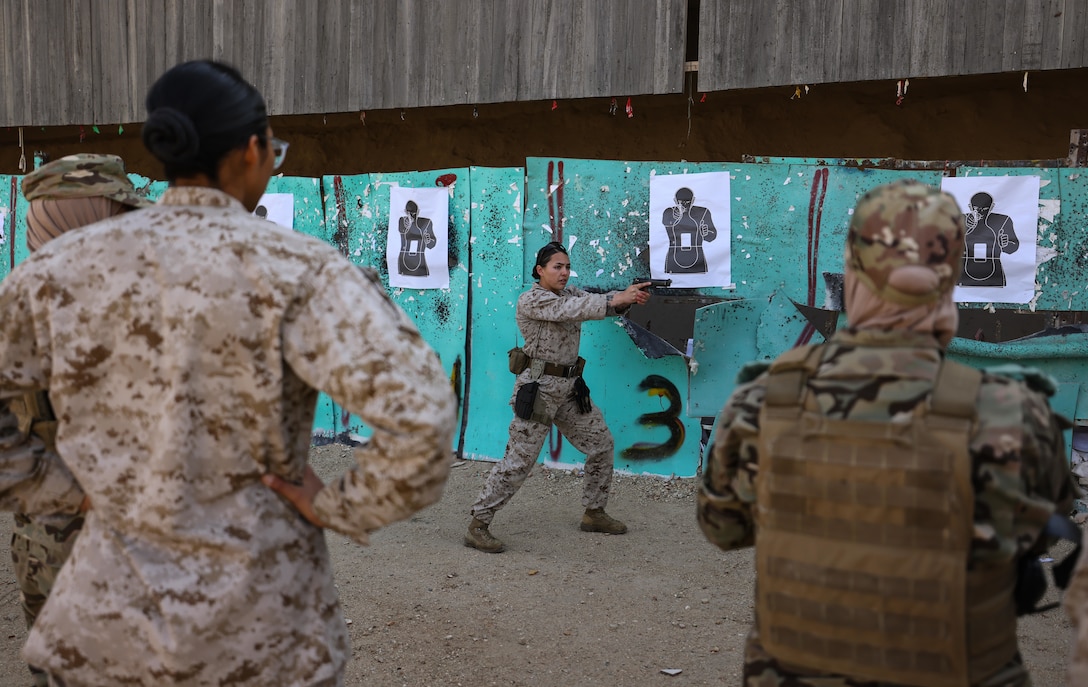 U.S. Marine Corps Sgt. Brianna Eisenhower, a combat marksmanship trainer assigned to Weapons and Field Training Battalion, Marine Corps Recruit Depot San Diego, demonstrates a drill during an all-female marksmanship subject matter expert exchange between U.S. Marines and Jordanian Soldiers in Zarqa, Jordan, Feb. 21, 2024. U.S. Marine Corps Forces Central Command and the Jordanian Armed Forces developed the exchange to highlight the similarities in marksmanship training and the impacts that inclusivity has within our militaries. (U.S. Marine Corps photo by Sgt. Angela Wilcox)