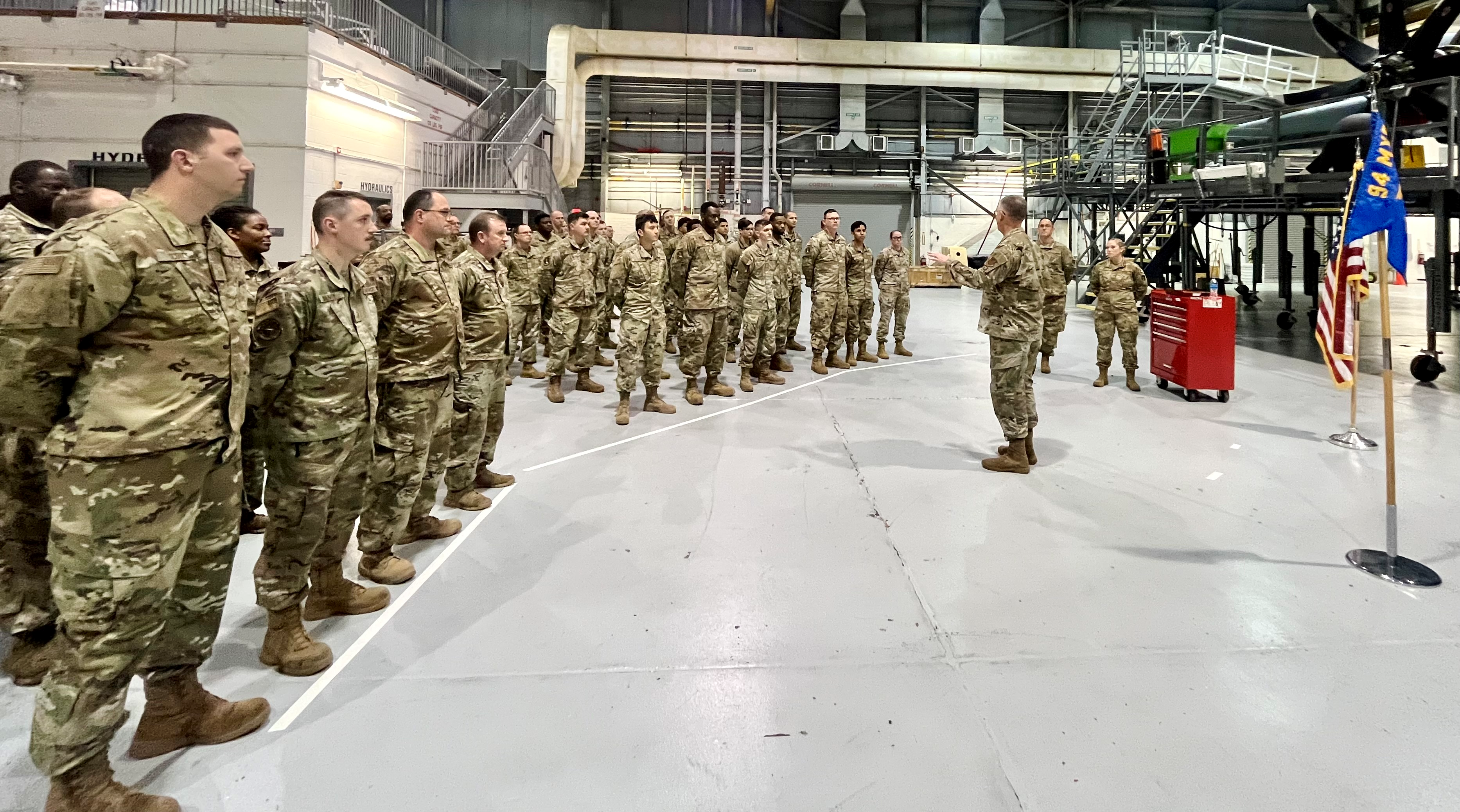 Brig. Gen. James Hartle, U.S. Air Force Associate Director of Logistics and Deputy Chief of Staff for Logistics, Engineering and Force Protection Directorate, talks to Airmen from the 94th Maintenance Group during a visit to Dobbins Air Reserve Base, Ga., on March 2, 2024. During his visit, Hartle recognized 20 members of the group for outstanding performance, mission support and innovation. (U.S. Air Force photo by Capt. Paris Krula)