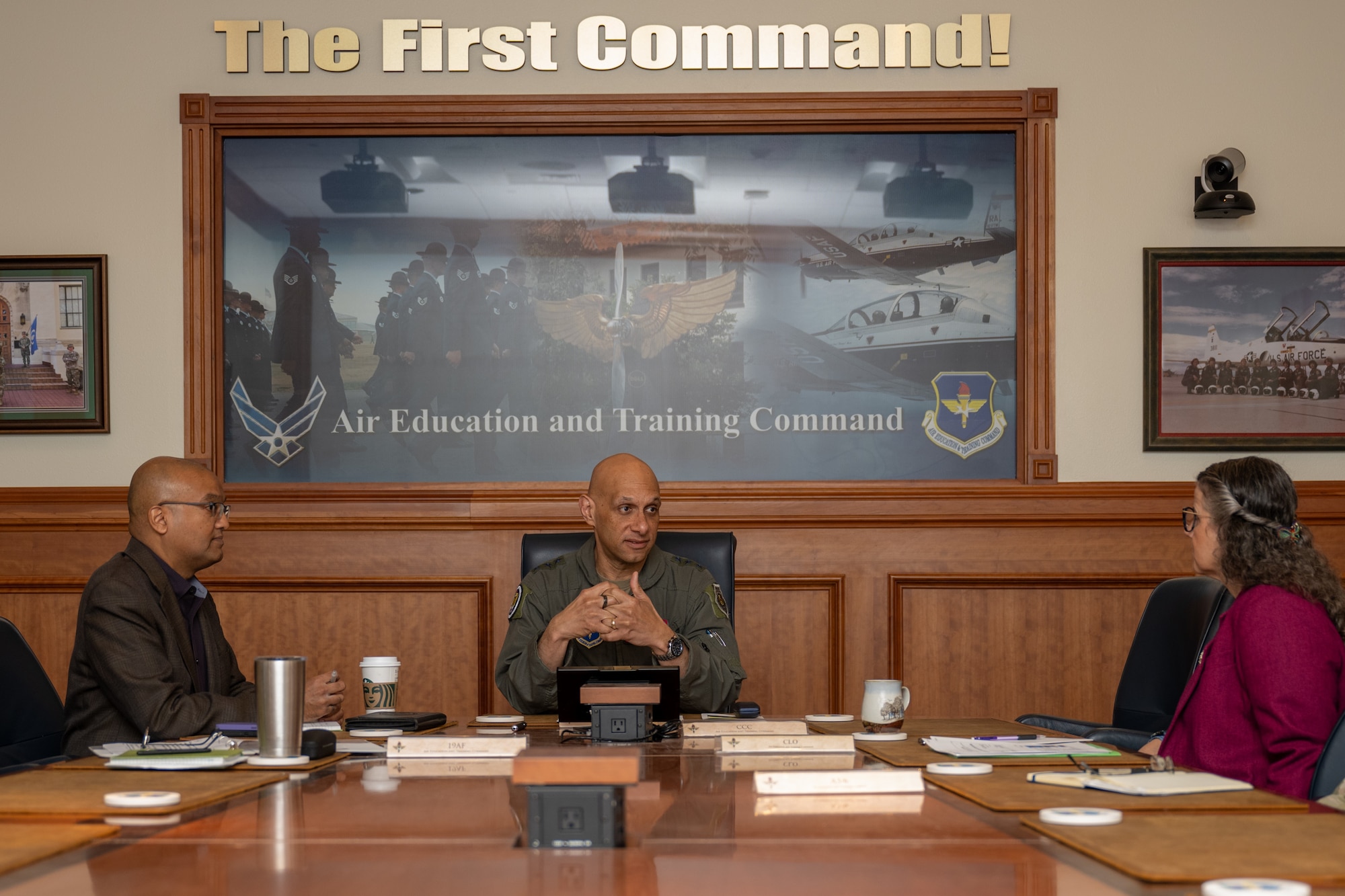 Photo of Dr. Sandeep Mulgund, Headquarters Air Force senior advisor to the deputy chief of staff for operations, speaks with U.S. Air Force Lt. Gen. Brian S. Robinson, commander of Air Education and Training Command, during a visit to AETC headquarters at Joint Base San Antonio-Randolph, Texas, March 7, 2024.