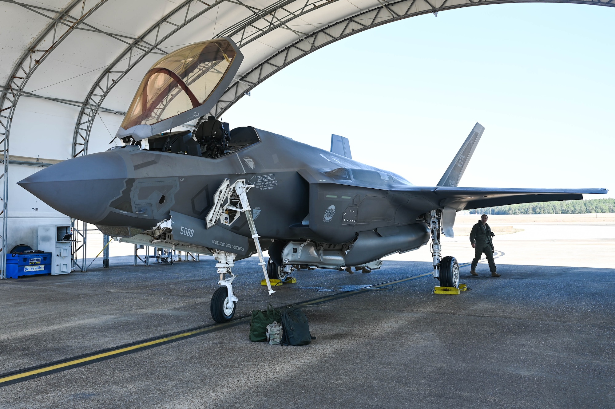 U.S. Air Force Maj. Daniel Hood, 58th Fighter Squadron pilot, performs a pre-flight check on an F-35A Lightning II at Eglin Air Force Base, Florida, Feb. 20, 2024.