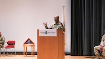 Maj. Gen. Rodney Boyd, Assistant Adjutant General Army of the Illinois National Guard speaks to the Soldiers and families of the 933rd Military Police Company based in Fort Sheridan, Illinois on March 9th during a welcome home ceremony at the College of Lake County, in Grayslake, Illinois.
