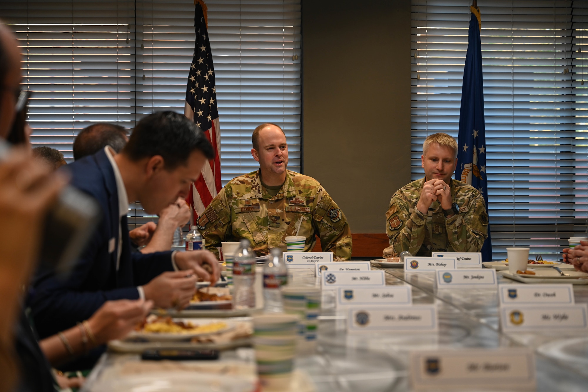 People sit at a table.
