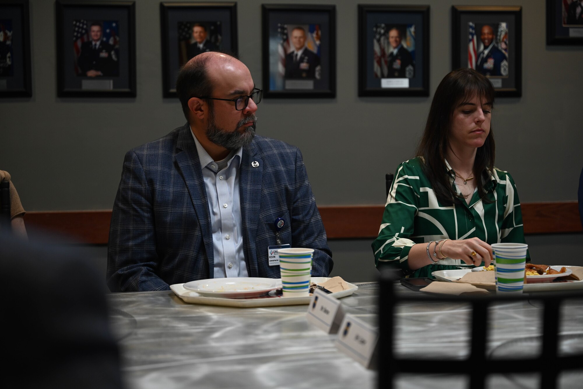 People sit at a table.
