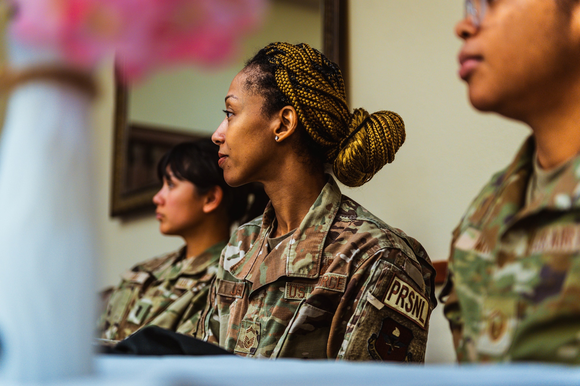 U.S. Air Force Senior Master Sgt. Zaneta Jackson, Force Support Squadron military personnel flight chief, attends the Women’s History Month exposition.