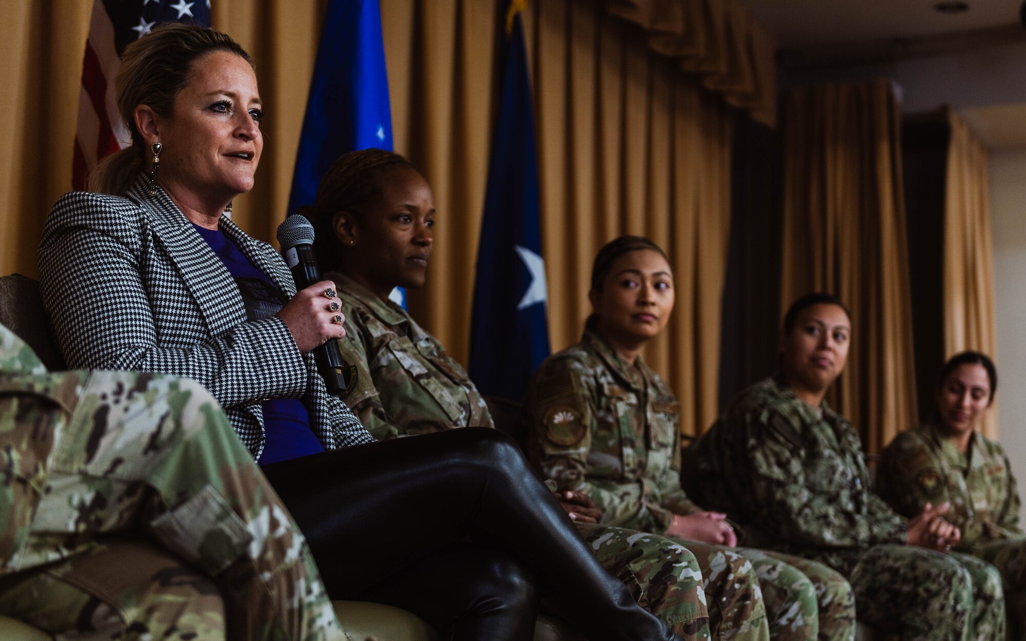 Melissa Rueschhoff, Special Victims Unit criminal prosecutor and Air Education Training Command senior leader spouse, speaks at the Women’s History Month exposition.