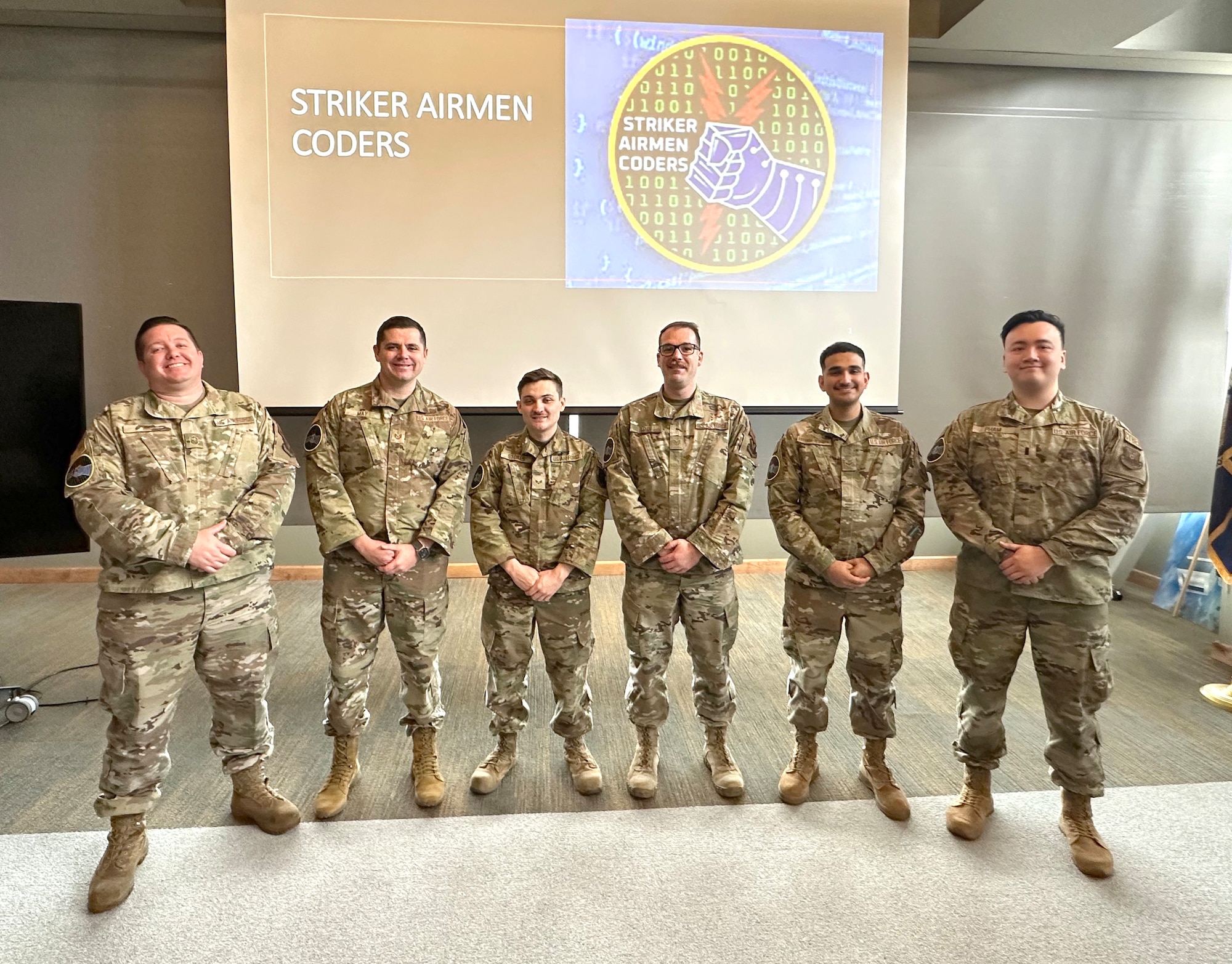 Airmen from various units belonging to Air Force Global Strike Command pose for a photo after graduating from the command’s Striker Airmen Coder program in Bossier City, Louisiana, on March 12, 2024. The team was the sixth cohort of Airmen to finish the six-month program, administered by the Cyber Innovation Center through a partnership intermediary agreement with AFGSC, that is aimed at training Airmen in software development, data analytics and other essential coding skill; equipping them to innovate and efficiently solve technical problems in their own units. (U.S. Air Force photo by Sean Green)