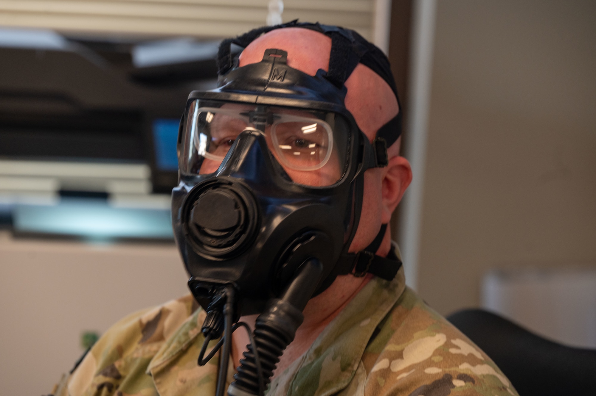 U.S. Air Force Tech. Sgt. Jesse Shepard, 563rd Rescue Group non-commissioned officer in charge of mobility, wears a M69 Joint Service Aircrew Mask Strategic Aircraft respirator mask at Davis-Monthan Air Force Base, Ariz., March 5, 2024. Shepard attended a new equipment training course for the M69 mask. (U.S. Air Force photo by Airman 1st Class Robert Allen Cooke III)