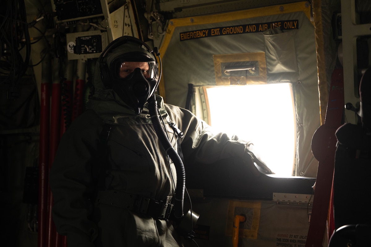 U.S. Air Force Airman 1st Class Trinity Bowling, 563rd Operations Support Squadron aircrew flight equipment technician, trains with the new M69 Joint Service Aircrew Mask Strategic Aircraft respirator mask at Davis-Monthan Air Force Base, Ariz., March 6, 2024. During the new equipment training, Bowling learned that the M69 helps protect members in environments with chemical, biological, radiological, nuclear agents. (U.S. Air National Guard photo by Senior Airman Guadalupe Beltran)