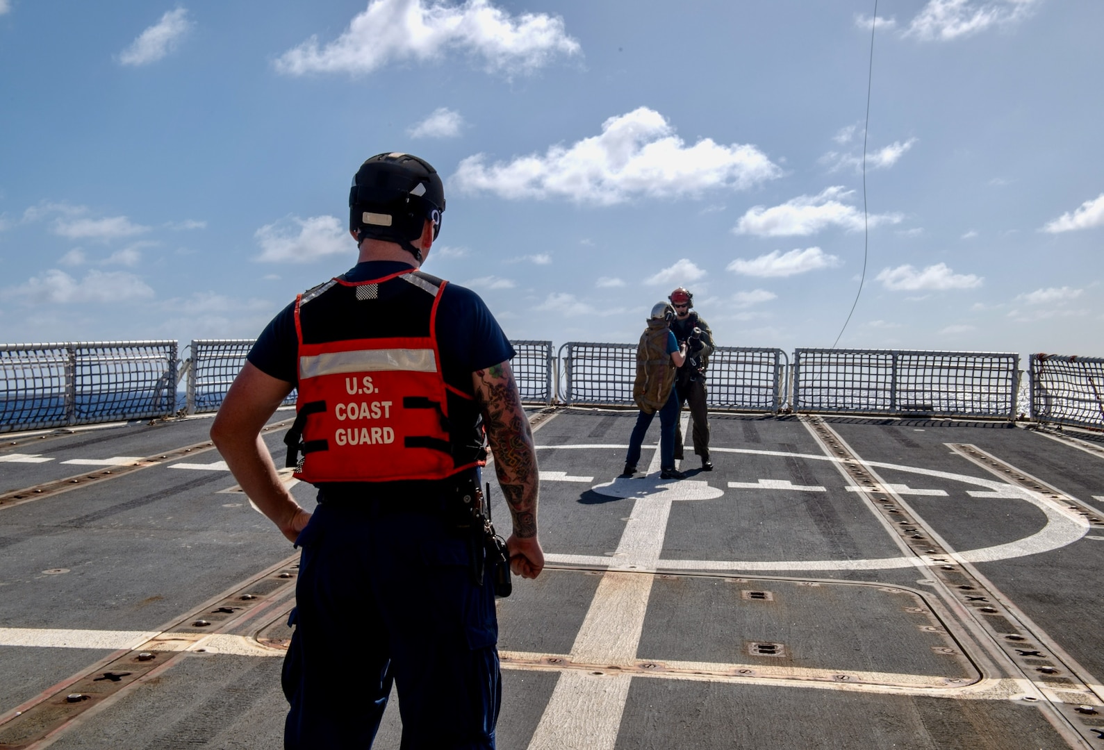On March 6, 2024, the U.S. Coast Guard and U.S. Navy's Helicopter Sea Combat Squadron 25 (HSC-25) effectively evacuated a U.S. Coast Guard member from the USCGC Polar Star (WAGB 10), 100 nautical miles south of Guam, in a joint effort.  The incident began on March 5, when the Joint Rescue Sub-Center (JRSC) Guam received a communication from the Polar Star crew regarding a 43-year-old man aboard experiencing severe abdominal pain. Recognizing the need for urgent medical attention beyond the capabilities available on ship, watchstanders directed the cutter to reroute closer to Guam and initiate a medical evacuation. (U.S. Coast Guard photo by Petty Officer 2nd Class Ryan Graves)