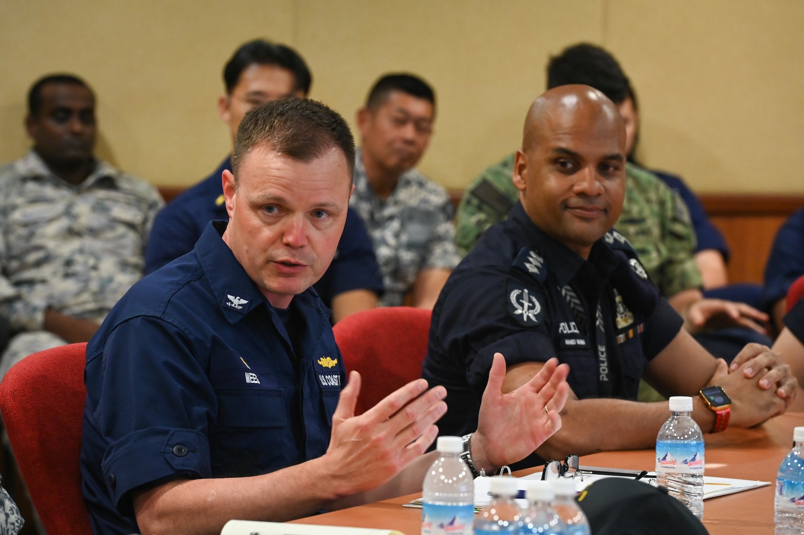 Capt. Billy Mees, commanding officer of U.S. Coast Guard Cutter Bertholf (WMSL 750), speaks during a meeting with Republic of Singapore Navy and the Singapore Police Coast Guard at the Changi Naval Base, Feb. 26, 2024. The meeting focused on how the United States and Singapore can foster collaborative partnerships through professional and at-sea engagements. (U.S. Coast Guard photo by Petty Officer Steve Strohmaier)