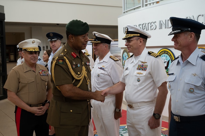 Major General Jone Kalouniwai, Commander of the Republic of Fiji Military Forces, greets directorates during an honors ceremony at USINDOPACOM headquarters. USINDOPACOM is committed to enhancing stability in the Asia-Pacific region by promoting security cooperation, encouraging peaceful development, responding to contingencies, deterring aggression and, when necessary, fighting to win. (U.S. Army photo by Sgt. Austin Riel)
