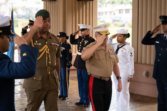 Major General Jone Kalouniwai, Commander of the Republic of Fiji Military Forces, left, stands beside Lt. Gen. Stephen Sklenka, deputy commander of U.S. Indo-Pacific Command, right, during an honors ceremony at USINDOPACOM headquarters. USINDOPACOM is committed to enhancing stability in the Asia-Pacific region by promoting security cooperation, encouraging peaceful development, responding to contingencies, deterring aggression and, when necessary, fighting to win. (U.S. Army photo by Sgt. Austin Riel)