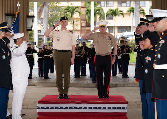 Gen. Valdemaras Rupsys, Lithuanian Chief of Defense, left, stands beside Lt. Gen. Stephen Sklenka, Deputy Commander of U.S. Indo-Pacific Command, right, during an honors ceremony at U.S. Indo-Pacific Command headquarters, Camp H.M. Smith, Hawaii, March 11, 2024. Rupsys met with USINDOPACOM leadership to discuss opportunities for cooperation in the Indo-Pacific. USINDOPACOM is committed to enhancing stability in the Asia-Pacific region by promoting security cooperation, encouraging peaceful development, responding to contingencies, deterring aggression and, when necessary, fighting to win. (U.S. Navy photo by Mass Communication Specialist 1st Randi Brown)